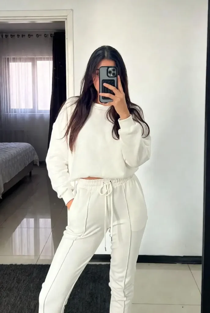 "Comfy athleisure outfit ideas with white pants using joggers and sweatshirt for casual wear"