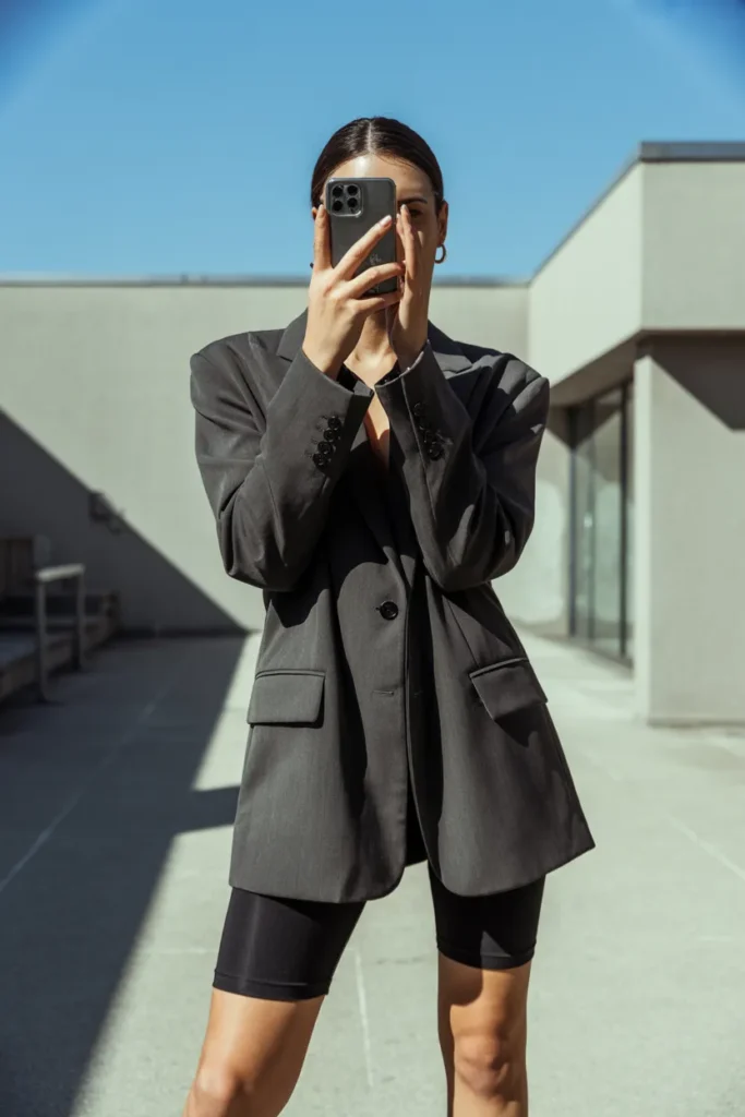 Oversized blazer paired with bike shorts for a trendy street style from 10 Cute Simple Outfit Ideas.