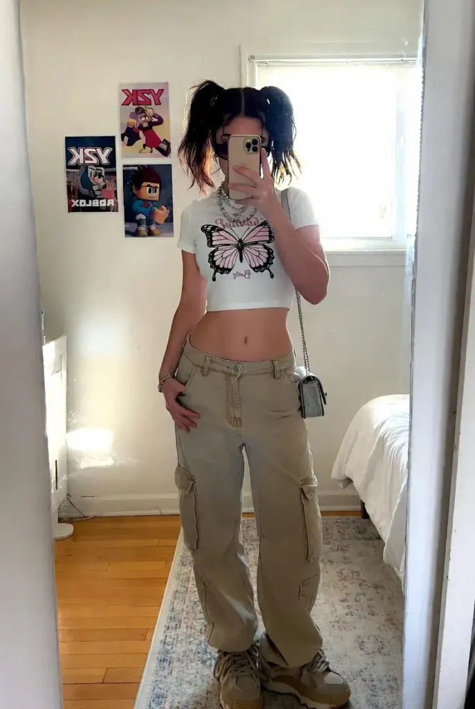 White butterfly crop tee with beige cargo pants and chain necklace — Y2K Roblox aesthetic outfits real life