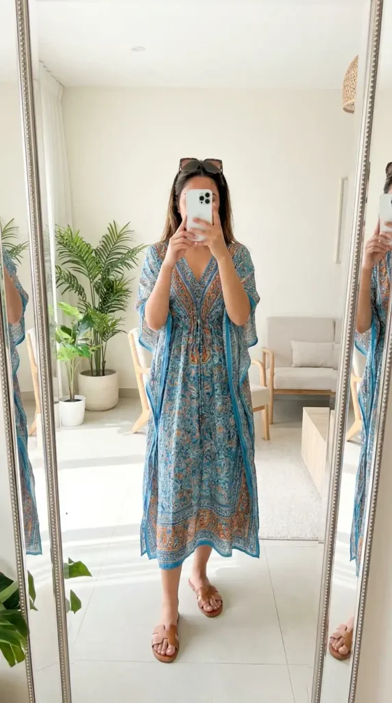 Blue boho kaftan dress with flat brown sandals — effortless summer family reunion outfit ideas for women