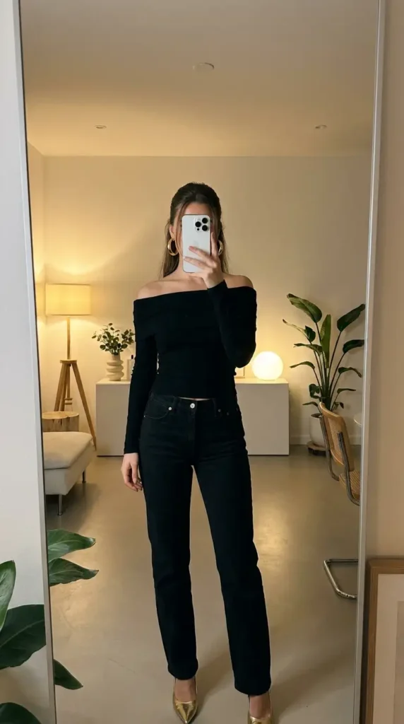 Casual black and gold party outfit ideas with a black off-shoulder long-sleeve top, black jeans, and gold pointed heels.
