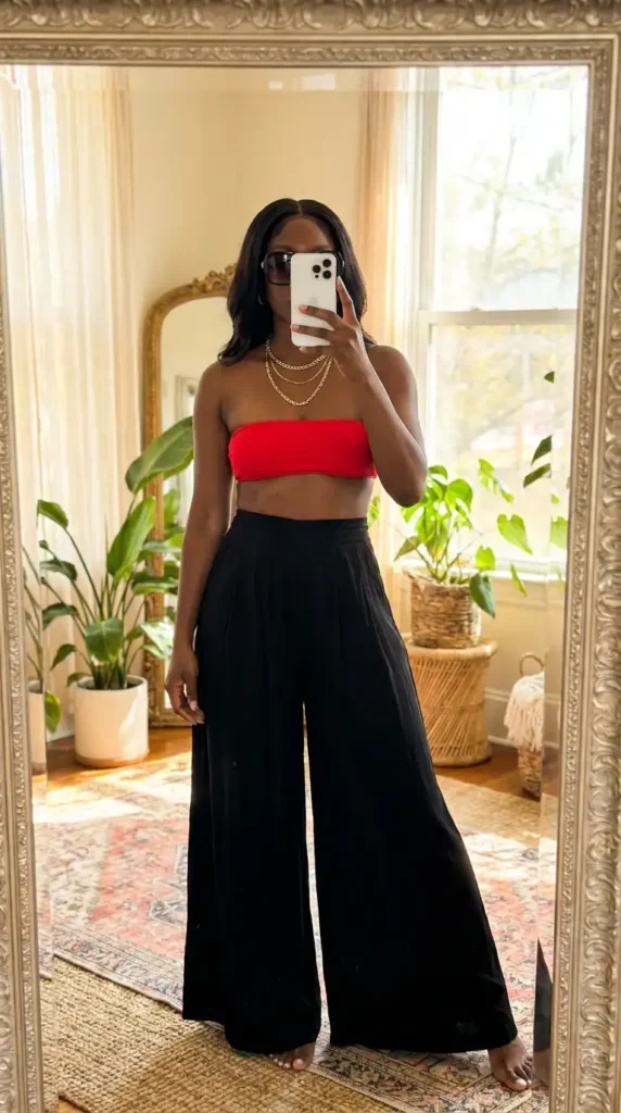 Red bandeau top with black wide-leg palazzo pants and gold chains – summer red and black outfit black women
