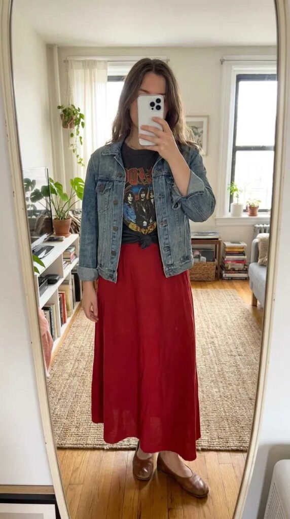 Fall Long Red Skirt Outfit Ideas in a graphic tee, denim jacket, and red midi skirt.
