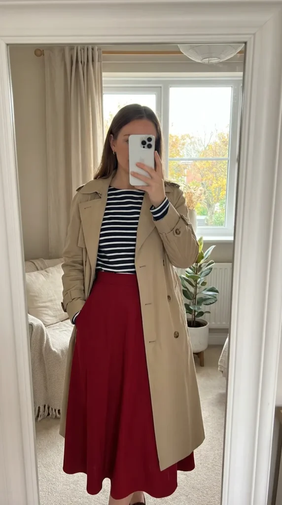 Fall Long Red Skirt Outfit Ideas with a striped tee, trench coat, and red midi skirt.
