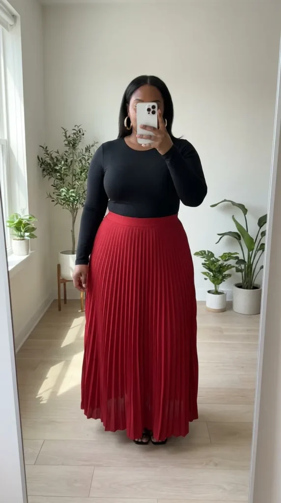 Curvy woman in black bodysuit with long red pleated skirt, chic Long Red Skirt Outfit Ideas for Plus Size