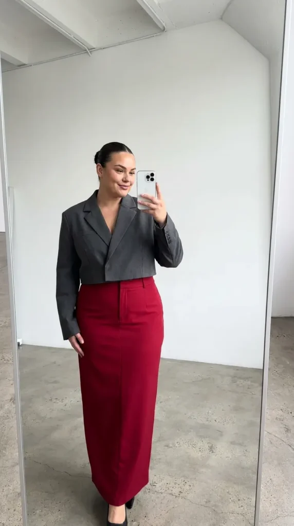 Plus size woman in graphic tee with long red tulle skirt, fun Long Red Skirt Outfit Ideas for Plus Size women