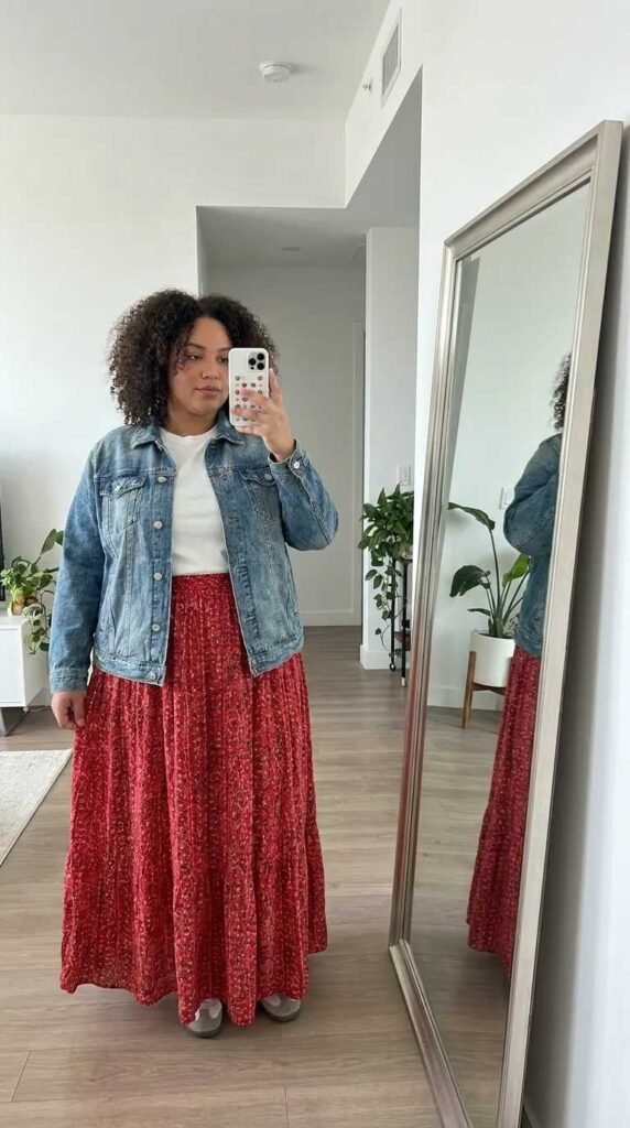 Plus size woman in denim jacket and long red flowy skirt, great Long Red Skirt Outfit Ideas for Plus Size women